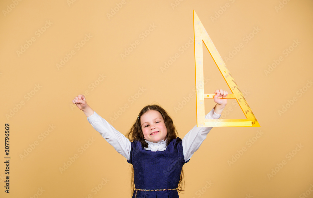 Kids Using A Ruler Kid school uniform hold ruler. School education concept. Learn ...