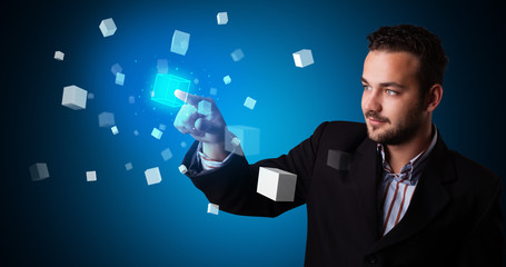 Poster - Man touching hologram screen displaying cube symbols