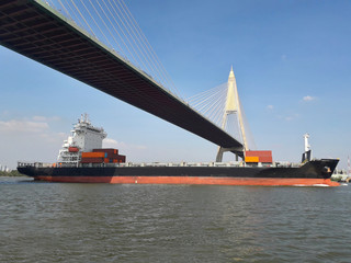 Large barges sailing on the river To deliver products to customers