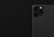 Close Up Photo Of Modern Smartphone With Triple Lens Camera