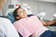 © Yakobchuk Olena - Joyful little girl visiting her professional dentist