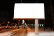 © Alex - advertising billboard in the city at night in winter. Ad design mockup with white field. near the road