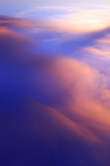 Wall Mural - Abstract fantasy softly blue mountain clouds background, Gold fog with sun highlight on blue sky and moving cloud before sunset by airal view