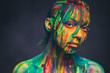 © Nejron Photo - Young woman covered with a colourful paint