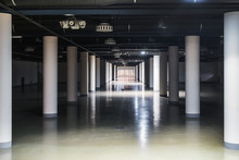 Long Corridor With Round Columns In The Basement Of The Building