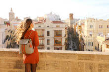Visiting Valencia In Spain. Back View Of Young Traveler Woman Enjoying Cityscape Of Valencia, Europe.