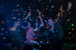 © May Chanikran - Holiday travel celebrations concept, group of people dancing together with enjoying at colourful night party club.