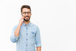 © Mangostar - Positive guy talking on cellphone, enjoying nice conversation. Handsome young man in casual shirt and glasses standing isolated over white background. Phone call concept