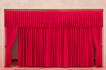 Theater interior with red curtains