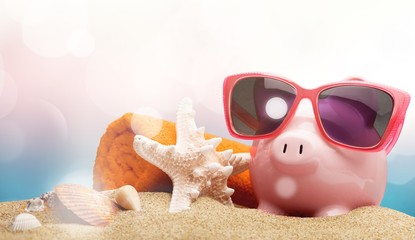 Sticker - Summer piggy bank with sunglasses on the beach