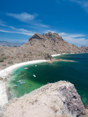 Wall Mural - Indonesia, november 2019: Padar Island near Komodo Island, Indonesia. Beautiful paradise island hiking to the top and seeing the view all over the bays of the island in archipelago