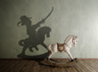 The concept of hidden opportunities and undisclosed potential. a toy horse that casts a shadow over a boy. 3D illustration