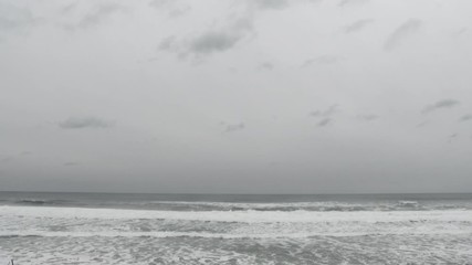 Wall Mural - Rain Storm Over Crashing Ocean Waves Time Lapse