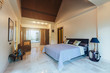 © Annatamila - Modern bed room interior in Luxury villa. Big window, light space, marble floor