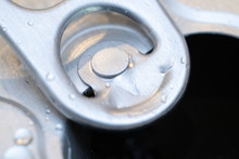 Aluminium soda beer can pop tab opener close up