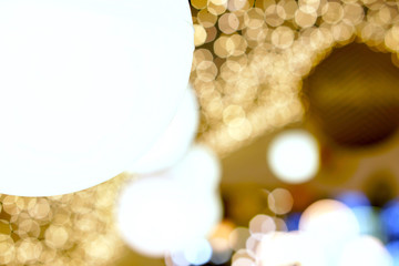 Wall Mural - Closeup decorate Christmas lamps hang on    tunnel lights on blurred and bokeh of led reflection lightning background.