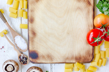 Sticker - Kitchen board surrounded by vegetables and spices.