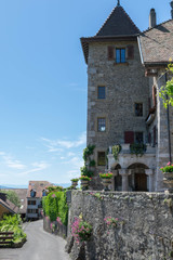 Wall Mural - Medieval street in village in Franch area of Switzerland