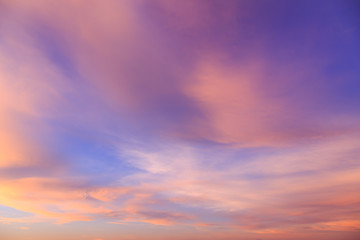 Wall Mural - Abstract fantasy softly colorful clouds background, Gold fog with sun highlight on blue sky and moving cloud before sunset by airal view