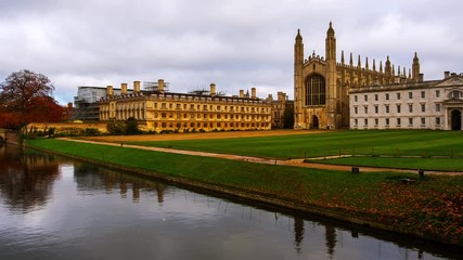 Canvas Print - Cambridge, UK. View of Cambridge University with King College Chapel in Cambridge, England, UK during the cloudy autumn day. Time-lapse with boats in the river, zoom in