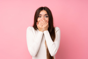 Wall Mural - Young woman over isolated pink background with surprise facial expression