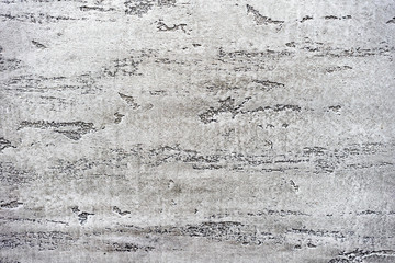 Gray seamless venetian stucco with stripes. Background and texture of decorative plaster.