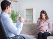 © Elnur - Pregnant woman visiting psychologist doctor
