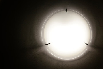 Poster - Refined close-up photo of round ceiling lamp, wall lamp or sconce in soft shades of black and white palette. Minimalist modern architecture or interior detail as abstract background with copy space.