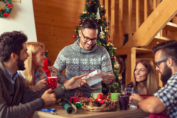 Canvas Print - Friends wrapping Christmas presents