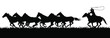 A vector silhouette of a cowboy chasing a herd of running horses.