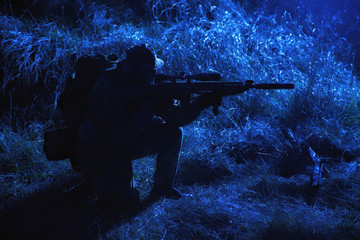 Infantry shooting with sniper rifle in darkness