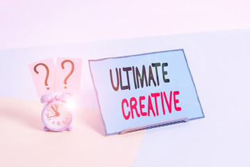 Leinwandbilder - Writing note showing Ultimate Creative. Business concept for way of producing or using original and unusual ideas Alarm clock beside a Paper sheet placed on pastel backdrop