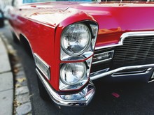 Headlight Of A Red Classic Car
