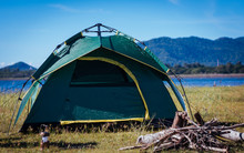 Camping Green Tent Near Lake