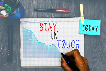 Wall Mural - Writing note showing Stay In Touch. Business concept for Keep Connected thru Phone Letters Visit Email Social Media