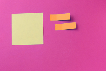 Wall Mural - Sticker notes on a bright pink background. Top view, copy space. Business concept, horizontal mock-up