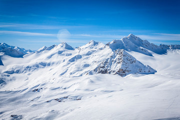 Winter panoramic view of the snowy high mountains of Elbrus in the Russia