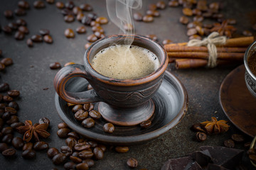 Black coffee on an old background in a cup