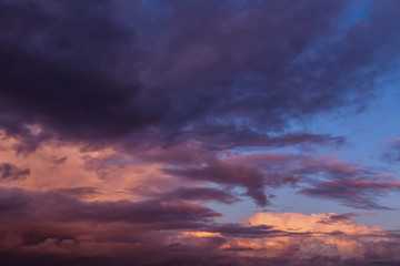 Wall Mural - Dramatic sunrise, sunset pink violet storm sky with clouds background texture