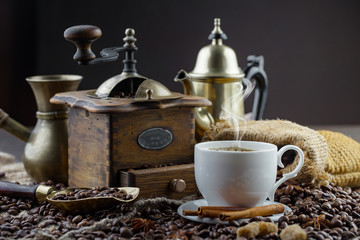 Black coffee on an old background in a cup