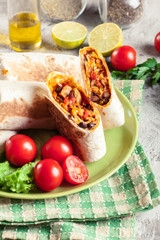 Wall Mural - Burritos wraps with mincemeat, beans and vegetables