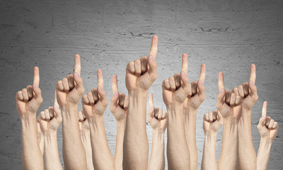 Wall Mural - Row of man hands showing finger pointing gesture