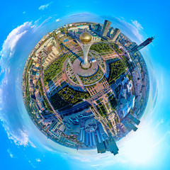 Beautiful panoramic (360 spherical panorama little planet) aerial drone view to Nursultan (Astana) city center with skyscrapers and Baiterek Tower, Kazakhstan (Qazaqstan)