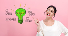 Green Light Bulb With Happy Young Woman