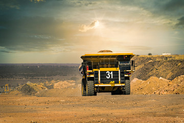 Wall Mural - Mining truck at sunset