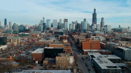 Wall Mural -  skyline view of Chicago downtown metropolitan area on a clear sunny day the vivid colors of the buildings architecture are amazing as the general traffic flows through the metropolis city 