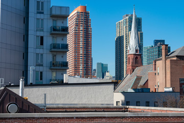 Wall Mural - Long Island City Queens New York Rooftop and Skyline scene with a Church Steeple