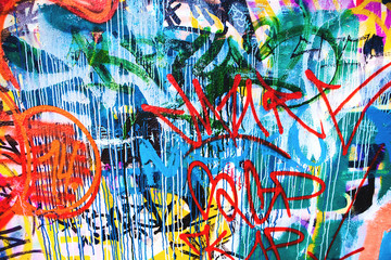 Closeup of damaged colorful urban wall texture