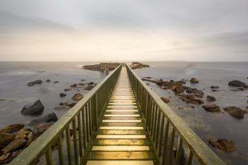  Pier of Ballycastle on a peaceful morning at the beach