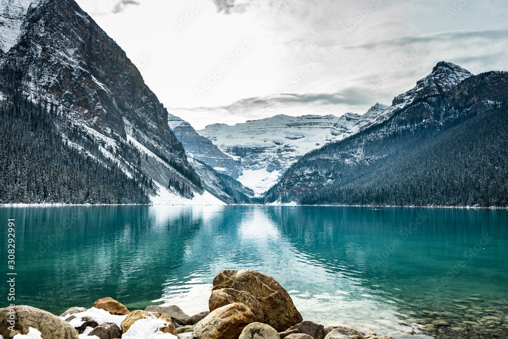 Lake louise panorama in winter with snow covered mountains, Banff National Park, Alberta, Canada - obrazy, fototapety, plakaty 